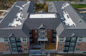 View of apartment building with many colors of paint