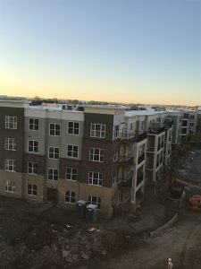 Aerial view of an apartment complex under construction
