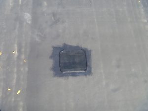 Hole in roof patched and Sealed