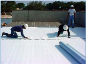 Employees of Advanced Construction Group working on a roof